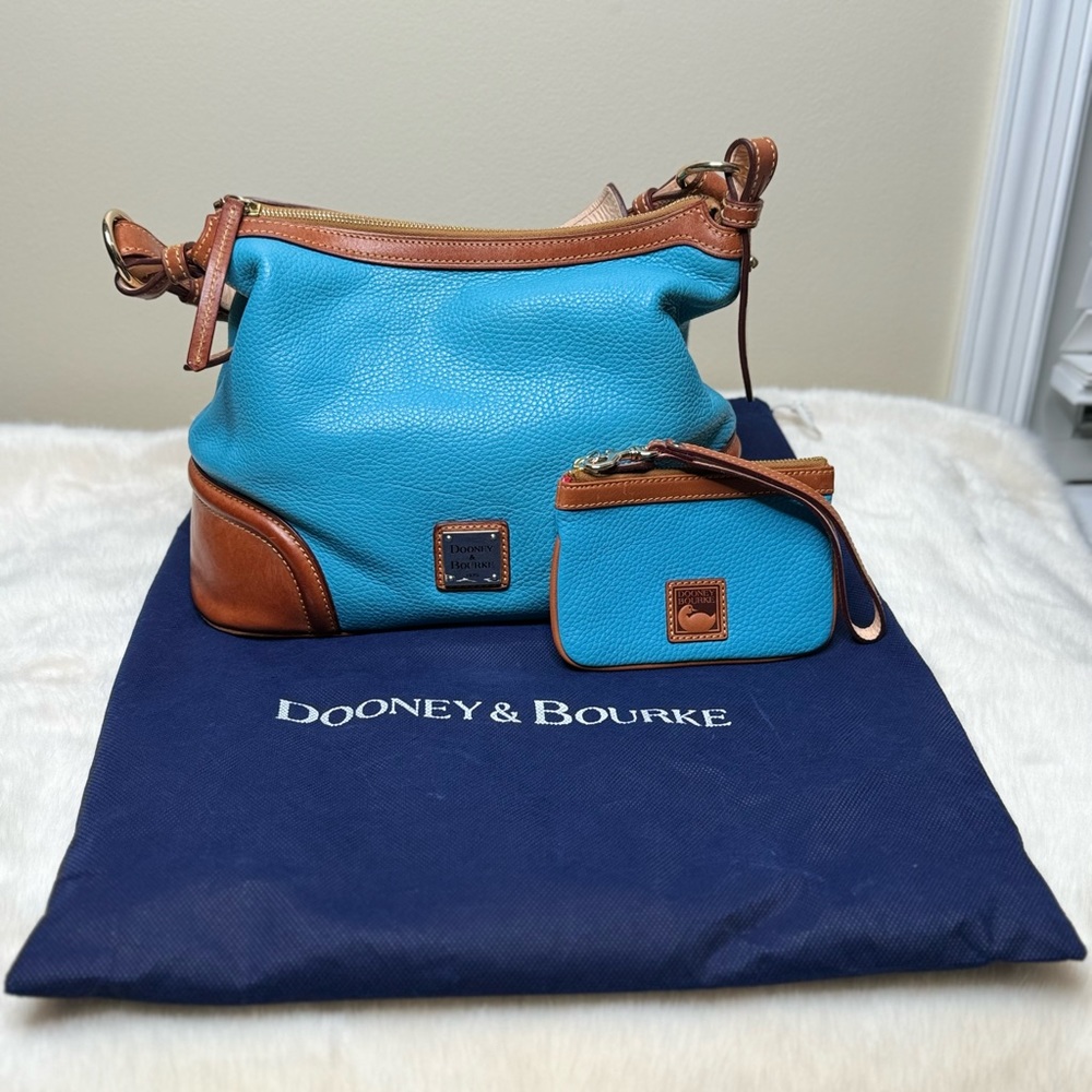 Sold- Dooney & Bourke leather bag with wristlet
